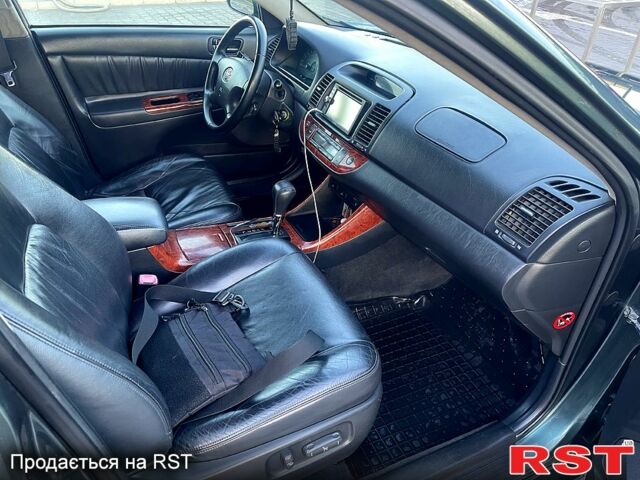 Зеленый Тойота Камри, объемом двигателя 3 л и пробегом 384 тыс. км за 6500 $, фото 3 на Automoto.ua