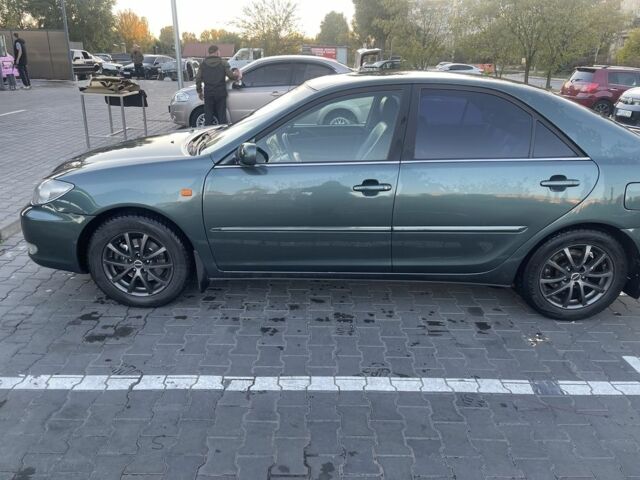 Зелений Тойота Камрі, об'ємом двигуна 3 л та пробігом 384 тис. км за 7300 $, фото 2 на Automoto.ua