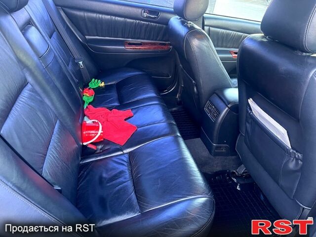 Зеленый Тойота Камри, объемом двигателя 3 л и пробегом 384 тыс. км за 6500 $, фото 5 на Automoto.ua