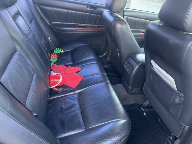 Зелений Тойота Камрі, об'ємом двигуна 3 л та пробігом 384 тис. км за 7300 $, фото 6 на Automoto.ua