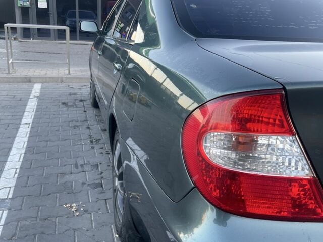 Зелений Тойота Камрі, об'ємом двигуна 3 л та пробігом 384 тис. км за 7300 $, фото 3 на Automoto.ua