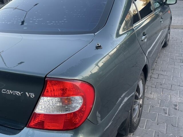 Зелений Тойота Камрі, об'ємом двигуна 3 л та пробігом 384 тис. км за 7300 $, фото 1 на Automoto.ua