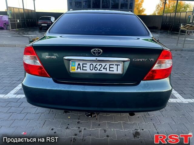 Зеленый Тойота Камри, объемом двигателя 3 л и пробегом 384 тыс. км за 6500 $, фото 1 на Automoto.ua