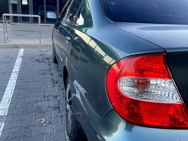 Зеленый Тойота Камри, объемом двигателя 3 л и пробегом 384 тыс. км за 6500 $, фото 2 на Automoto.ua