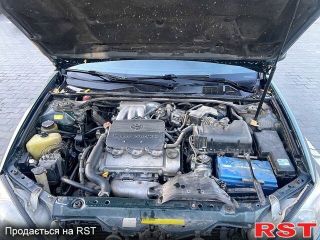 Зеленый Тойота Камри, объемом двигателя 3 л и пробегом 384 тыс. км за 6500 $, фото 7 на Automoto.ua