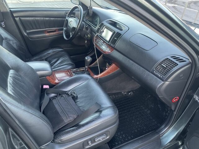 Зелений Тойота Камрі, об'ємом двигуна 3 л та пробігом 384 тис. км за 7300 $, фото 4 на Automoto.ua