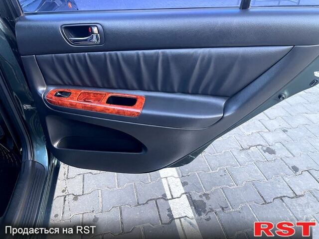 Зеленый Тойота Камри, объемом двигателя 3 л и пробегом 384 тыс. км за 6500 $, фото 4 на Automoto.ua