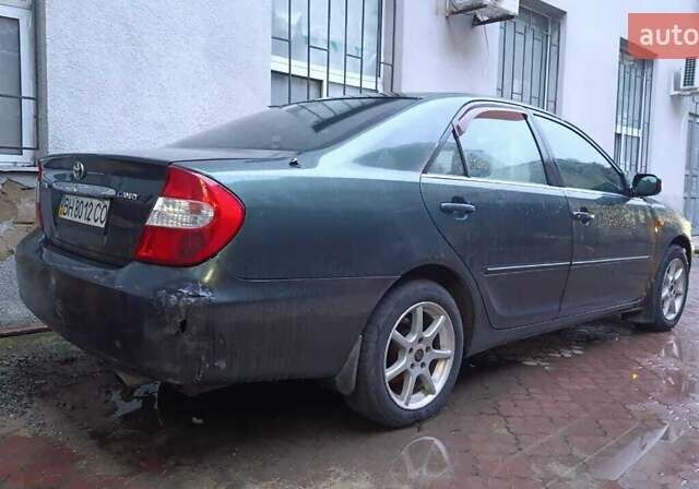 Зеленый Тойота Камри, объемом двигателя 2.36 л и пробегом 359 тыс. км за 4000 $, фото 1 на Automoto.ua