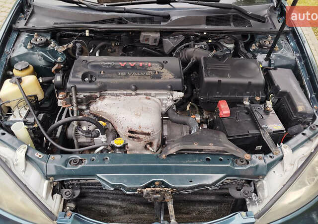 Зеленый Тойота Камри, объемом двигателя 2.4 л и пробегом 430 тыс. км за 4999 $, фото 4 на Automoto.ua