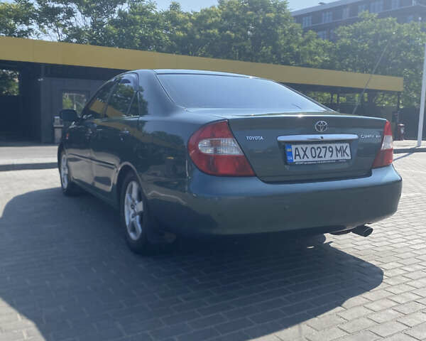 Зелений Тойота Камрі, об'ємом двигуна 2.4 л та пробігом 256 тис. км за 6000 $, фото 2 на Automoto.ua