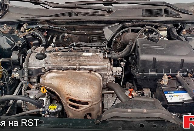 Зеленый Тойота Камри, объемом двигателя 2.4 л и пробегом 333 тыс. км за 5200 $, фото 7 на Automoto.ua