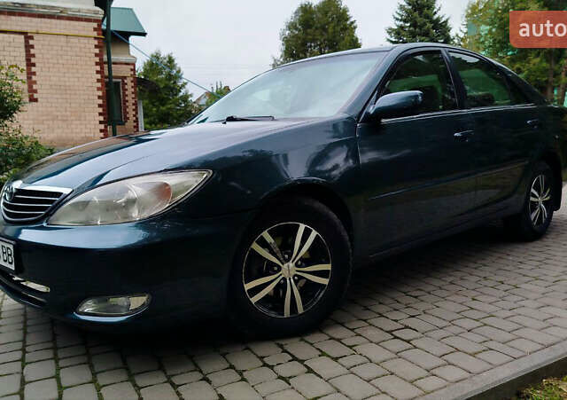 Зеленый Тойота Камри, объемом двигателя 2.4 л и пробегом 430 тыс. км за 4999 $, фото 5 на Automoto.ua