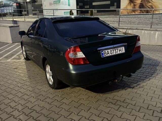 Зеленый Тойота Камри, объемом двигателя 3 л и пробегом 410 тыс. км за 4800 $, фото 1 на Automoto.ua