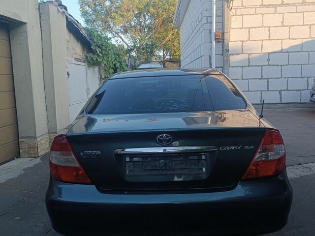 Зеленый Тойота Камри, объемом двигателя 2.4 л и пробегом 225 тыс. км за 5300 $, фото 3 на Automoto.ua