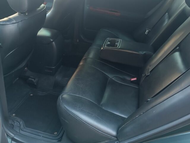 Зеленый Тойота Камри, объемом двигателя 2.4 л и пробегом 225 тыс. км за 5300 $, фото 9 на Automoto.ua