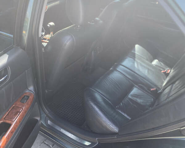 Зелений Тойота Камрі, об'ємом двигуна 2.4 л та пробігом 256 тис. км за 6000 $, фото 9 на Automoto.ua