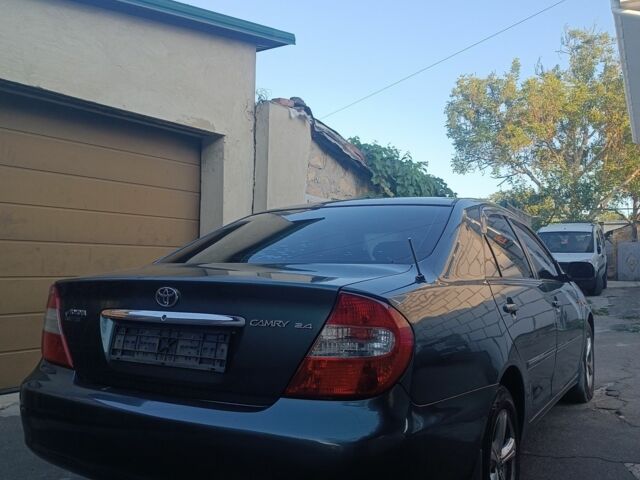 Зеленый Тойота Камри, объемом двигателя 2.4 л и пробегом 225 тыс. км за 5300 $, фото 5 на Automoto.ua