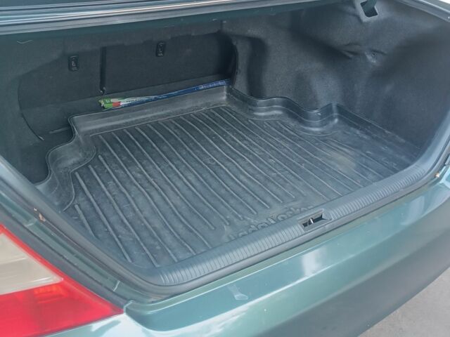 Зеленый Тойота Камри, объемом двигателя 2.4 л и пробегом 225 тыс. км за 5300 $, фото 7 на Automoto.ua