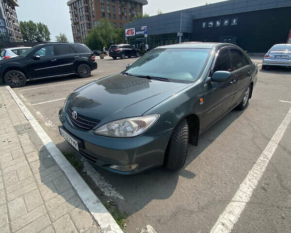 Зелений Тойота Камрі, об'ємом двигуна 2.4 л та пробігом 256 тис. км за 6000 $, фото 6 на Automoto.ua