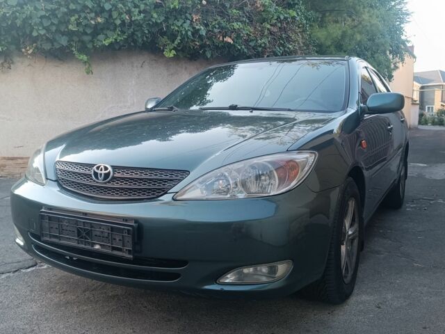 Зеленый Тойота Камри, объемом двигателя 2.4 л и пробегом 225 тыс. км за 5300 $, фото 2 на Automoto.ua