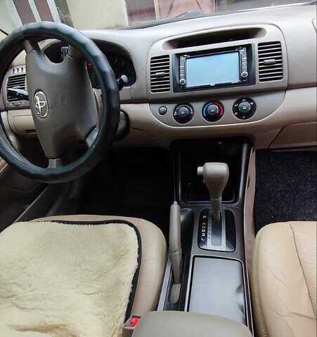 Зеленый Тойота Камри, объемом двигателя 2.4 л и пробегом 430 тыс. км за 4999 $, фото 10 на Automoto.ua