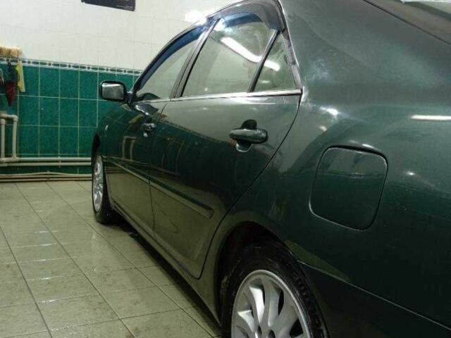 Зеленый Тойота Камри, объемом двигателя 2.4 л и пробегом 260 тыс. км за 3900 $, фото 1 на Automoto.ua