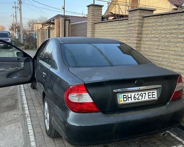 Зеленый Тойота Камри, объемом двигателя 2.4 л и пробегом 318 тыс. км за 3600 $, фото 3 на Automoto.ua