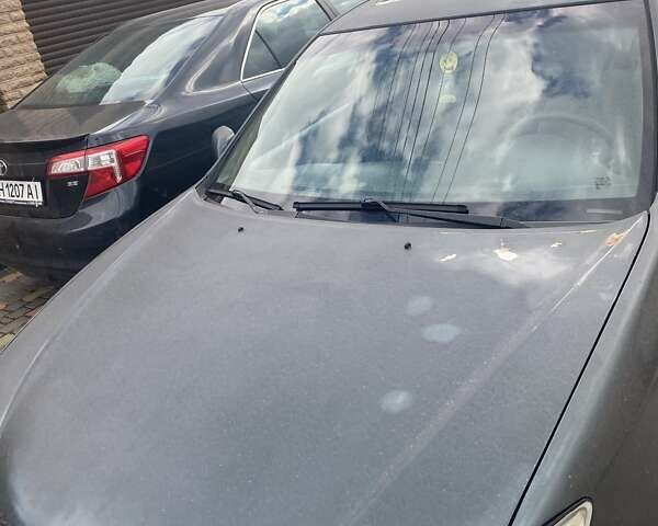 Зеленый Тойота Камри, объемом двигателя 2.4 л и пробегом 318 тыс. км за 3600 $, фото 4 на Automoto.ua