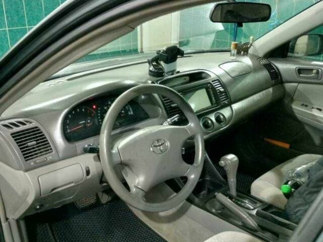 Зеленый Тойота Камри, объемом двигателя 2.4 л и пробегом 260 тыс. км за 3900 $, фото 5 на Automoto.ua