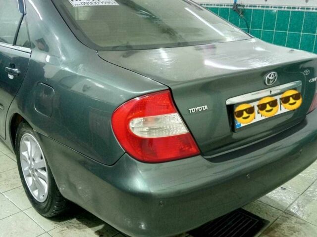 Зеленый Тойота Камри, объемом двигателя 2.4 л и пробегом 260 тыс. км за 3900 $, фото 2 на Automoto.ua