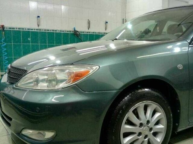 Зеленый Тойота Камри, объемом двигателя 2.4 л и пробегом 260 тыс. км за 3900 $, фото 3 на Automoto.ua