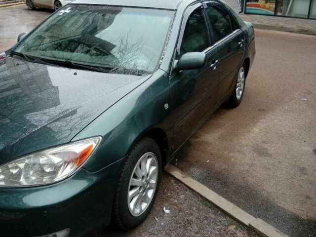 Зеленый Тойота Камри, объемом двигателя 2.4 л и пробегом 260 тыс. км за 3900 $, фото 6 на Automoto.ua