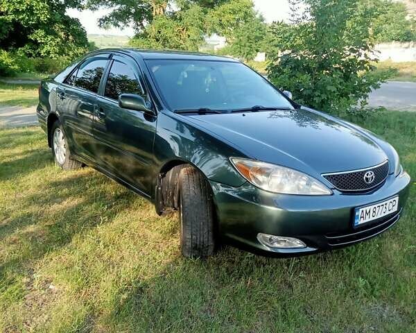 Зелений Тойота Камрі, об'ємом двигуна 2.36 л та пробігом 270 тис. км за 5300 $, фото 13 на Automoto.ua