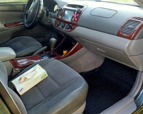 Зелений Тойота Камрі, об'ємом двигуна 2.36 л та пробігом 270 тис. км за 5300 $, фото 2 на Automoto.ua