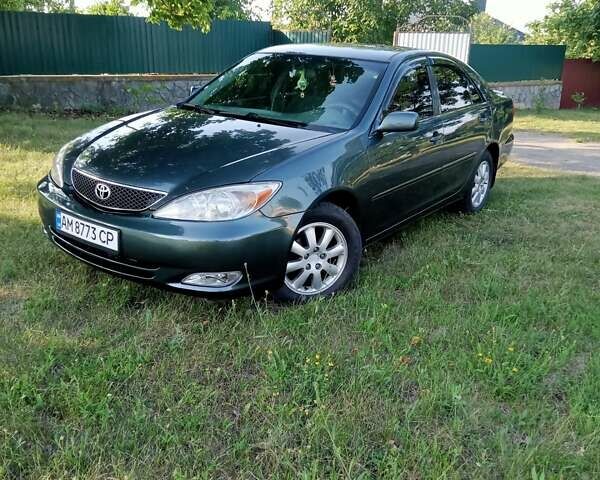 Зелений Тойота Камрі, об'ємом двигуна 2.36 л та пробігом 270 тис. км за 5300 $, фото 16 на Automoto.ua