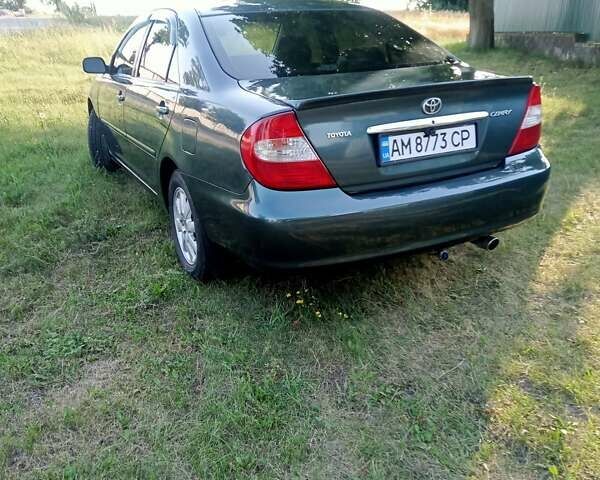 Зелений Тойота Камрі, об'ємом двигуна 2.36 л та пробігом 270 тис. км за 5300 $, фото 11 на Automoto.ua