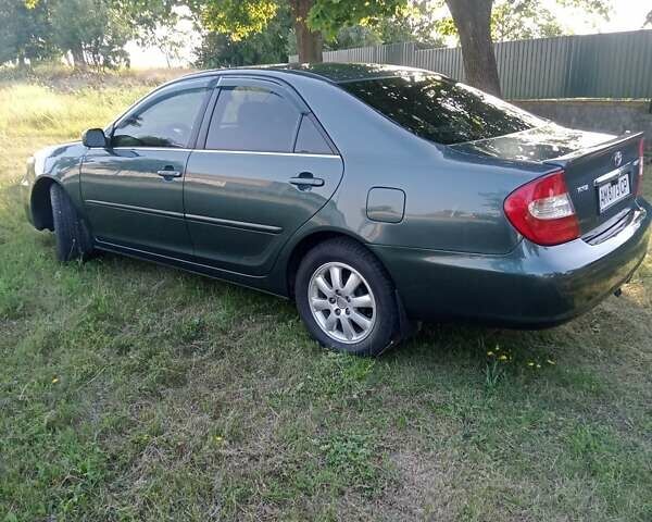 Зелений Тойота Камрі, об'ємом двигуна 2.36 л та пробігом 270 тис. км за 5300 $, фото 15 на Automoto.ua