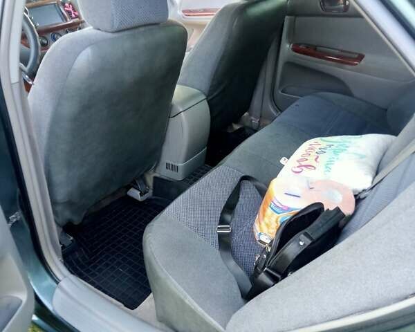 Зелений Тойота Камрі, об'ємом двигуна 2.36 л та пробігом 270 тис. км за 5300 $, фото 3 на Automoto.ua