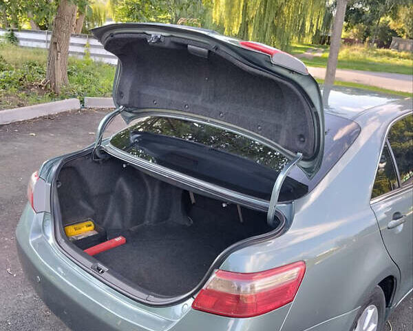 Зеленый Тойота Камри, объемом двигателя 2.4 л и пробегом 400 тыс. км за 10000 $, фото 5 на Automoto.ua