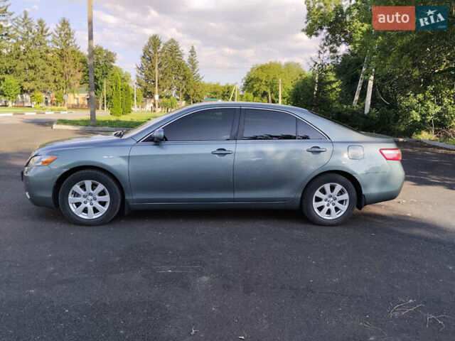 Зеленый Тойота Камри, объемом двигателя 2.4 л и пробегом 400 тыс. км за 10000 $, фото 2 на Automoto.ua