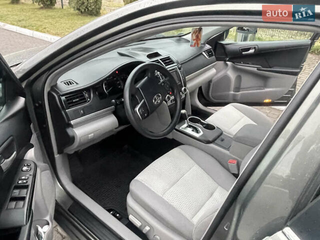 Зелений Тойота Камрі, об'ємом двигуна 2.49 л та пробігом 197 тис. км за 10400 $, фото 10 на Automoto.ua