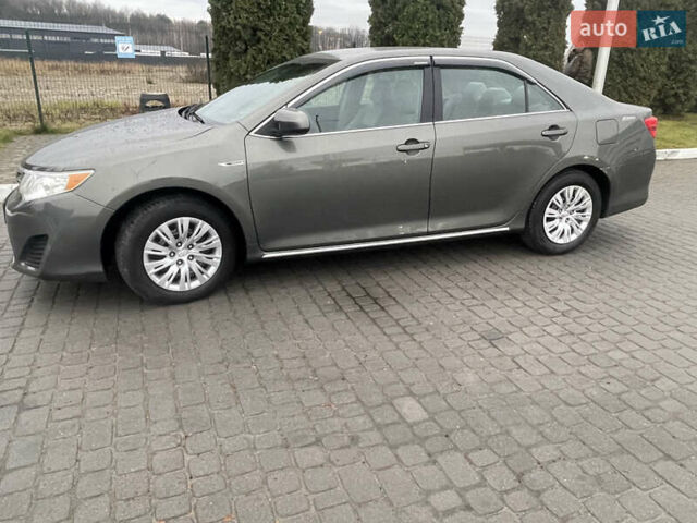 Зелений Тойота Камрі, об'ємом двигуна 2.49 л та пробігом 197 тис. км за 10400 $, фото 2 на Automoto.ua