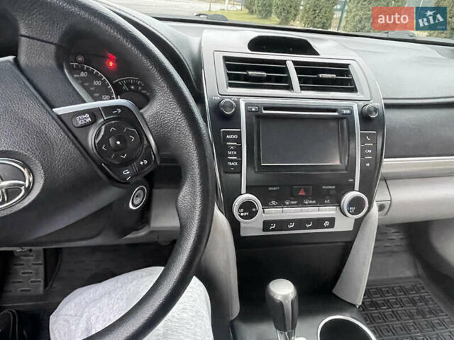 Зелений Тойота Камрі, об'ємом двигуна 2.49 л та пробігом 197 тис. км за 10400 $, фото 12 на Automoto.ua