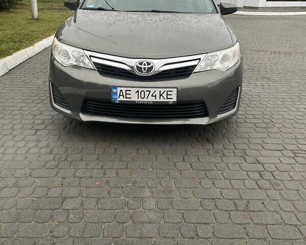 Зелений Тойота Камрі, об'ємом двигуна 2.49 л та пробігом 197 тис. км за 10400 $, фото 1 на Automoto.ua