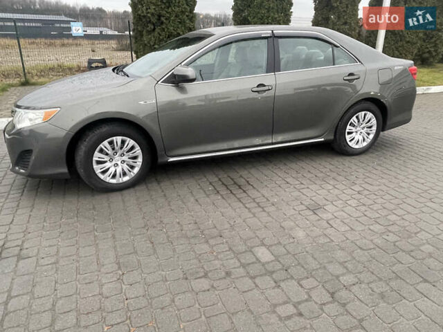 Зелений Тойота Камрі, об'ємом двигуна 2.49 л та пробігом 197 тис. км за 10400 $, фото 3 на Automoto.ua