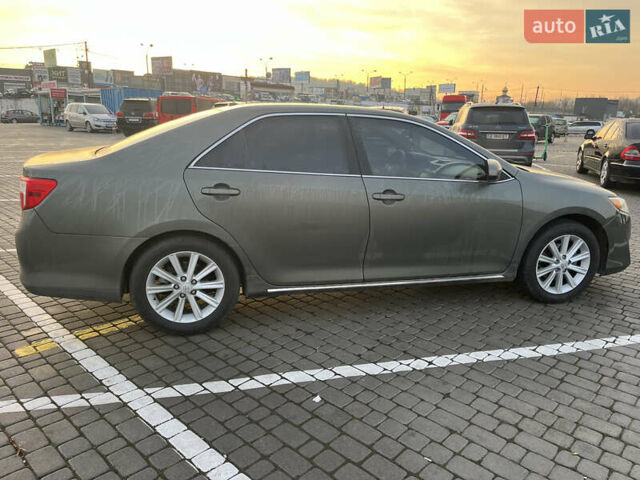 Зелений Тойота Камрі, об'ємом двигуна 2.49 л та пробігом 100 тис. км за 13500 $, фото 1 на Automoto.ua