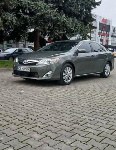 Зеленый Тойота Камри, объемом двигателя 2.5 л и пробегом 230 тыс. км за 11300 $, фото 3 на Automoto.ua