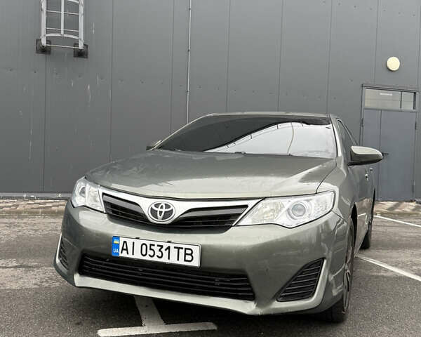 Зелений Тойота Камрі, об'ємом двигуна 2.49 л та пробігом 125 тис. км за 12800 $, фото 4 на Automoto.ua