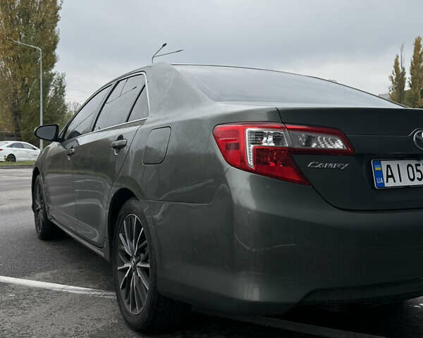 Зелений Тойота Камрі, об'ємом двигуна 2.49 л та пробігом 125 тис. км за 12800 $, фото 5 на Automoto.ua