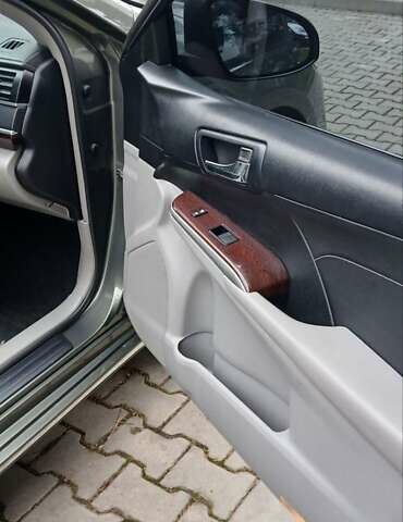 Зеленый Тойота Камри, объемом двигателя 2.5 л и пробегом 230 тыс. км за 11300 $, фото 15 на Automoto.ua